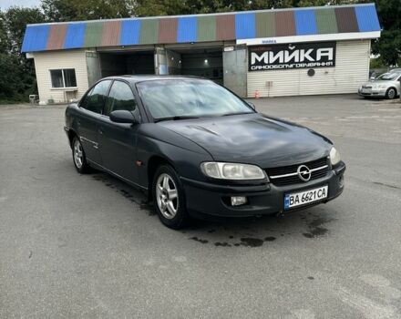 Сірий Опель Омега, об'ємом двигуна 2 л та пробігом 200 тис. км за 1200 $, фото 1 на Automoto.ua