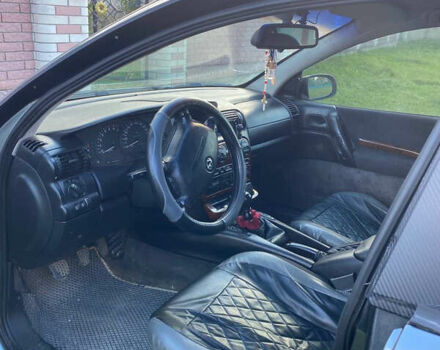 Серый Опель Омега, объемом двигателя 2.5 л и пробегом 402 тыс. км за 2300 $, фото 2 на Automoto.ua