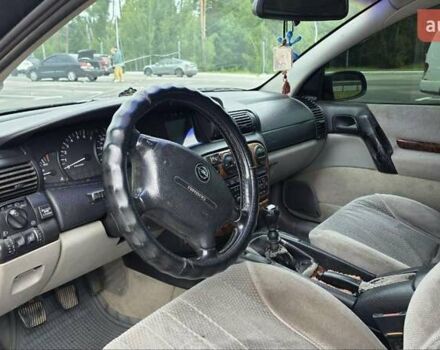 Сірий Опель Омега, об'ємом двигуна 2 л та пробігом 287 тис. км за 2200 $, фото 5 на Automoto.ua