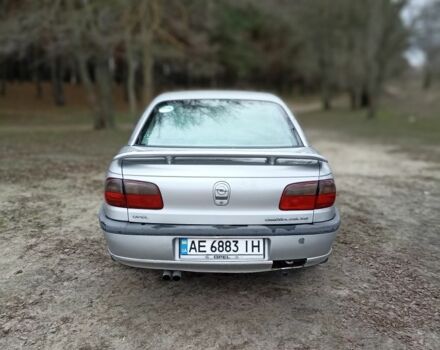 Серый Опель Омега, объемом двигателя 2.5 л и пробегом 230 тыс. км за 2000 $, фото 2 на Automoto.ua