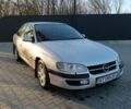 Серый Опель Омега, объемом двигателя 2 л и пробегом 300 тыс. км за 2200 $, фото 1 на Automoto.ua