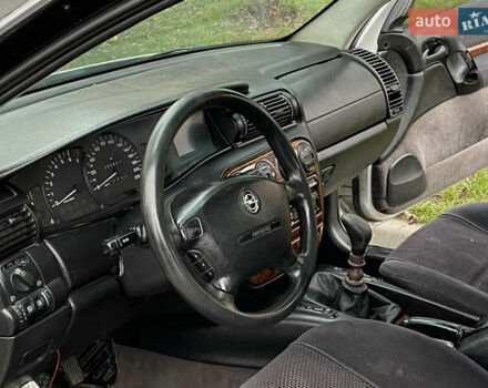 Серый Опель Омега, объемом двигателя 2 л и пробегом 380 тыс. км за 1450 $, фото 11 на Automoto.ua