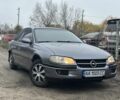 Серый Опель Омега, объемом двигателя 2 л и пробегом 295 тыс. км за 2200 $, фото 1 на Automoto.ua