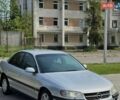 Серый Опель Омега, объемом двигателя 2 л и пробегом 305 тыс. км за 2400 $, фото 1 на Automoto.ua