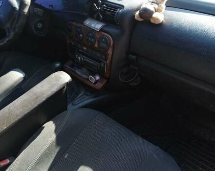 Сірий Опель Омега, об'ємом двигуна 2 л та пробігом 400 тис. км за 3000 $, фото 4 на Automoto.ua