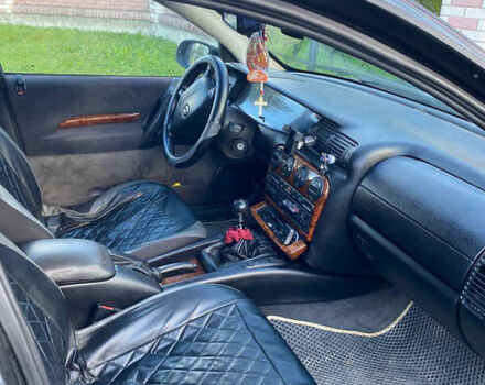 Серый Опель Омега, объемом двигателя 2.5 л и пробегом 402 тыс. км за 2300 $, фото 7 на Automoto.ua