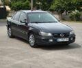 Сірий Опель Омега, об'ємом двигуна 2 л та пробігом 315 тис. км за 2999 $, фото 1 на Automoto.ua