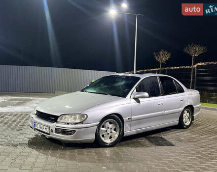 Серый Опель Омега, объемом двигателя 2.5 л и пробегом 250 тыс. км за 1550 $, фото 5 на Automoto.ua