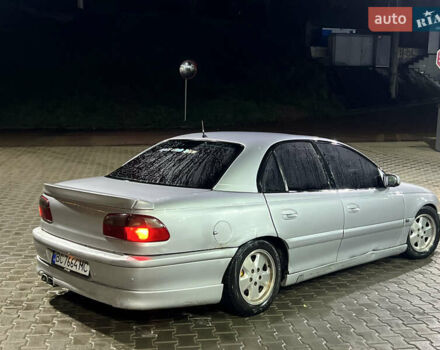 Серый Опель Омега, объемом двигателя 2.5 л и пробегом 250 тыс. км за 1550 $, фото 3 на Automoto.ua