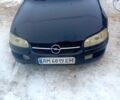 Сірий Опель Омега, об'ємом двигуна 2 л та пробігом 230 тис. км за 1700 $, фото 4 на Automoto.ua