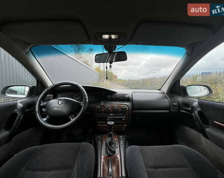 Сірий Опель Омега, об'ємом двигуна 2.5 л та пробігом 340 тис. км за 2399 $, фото 12 на Automoto.ua