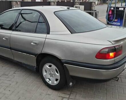 Серый Опель Омега, объемом двигателя 2.5 л и пробегом 380 тыс. км за 2700 $, фото 3 на Automoto.ua