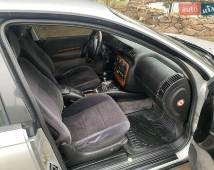 Сірий Опель Омега, об'ємом двигуна 2 л та пробігом 341 тис. км за 2300 $, фото 4 на Automoto.ua