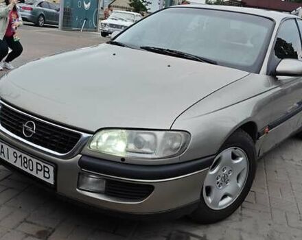 Серый Опель Омега, объемом двигателя 2.5 л и пробегом 380 тыс. км за 2700 $, фото 1 на Automoto.ua