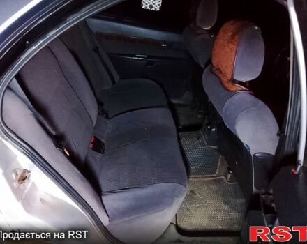 Сірий Опель Омега, об'ємом двигуна 2.2 л та пробігом 384 тис. км за 2000 $, фото 4 на Automoto.ua