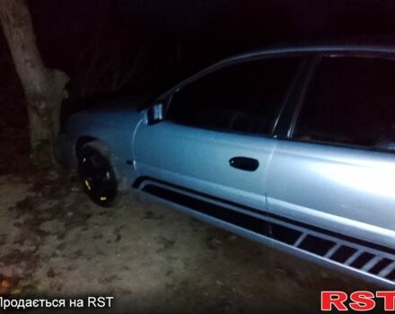 Сірий Опель Омега, об'ємом двигуна 2.2 л та пробігом 384 тис. км за 2000 $, фото 7 на Automoto.ua