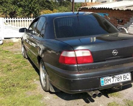 Сірий Опель Омега, об'ємом двигуна 2.5 л та пробігом 300 тис. км за 4400 $, фото 3 на Automoto.ua