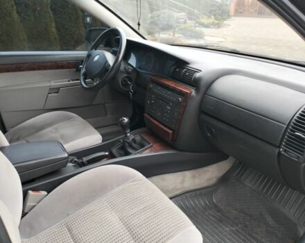 Серый Опель Омега, объемом двигателя 2.5 л и пробегом 320 тыс. км за 2400 $, фото 7 на Automoto.ua