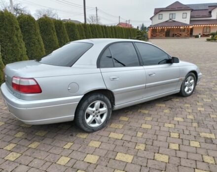 Серый Опель Омега, объемом двигателя 2.5 л и пробегом 320 тыс. км за 2400 $, фото 2 на Automoto.ua