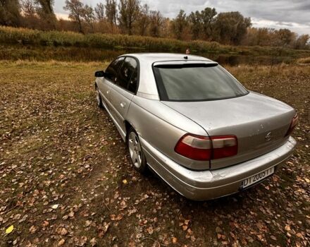 Серый Опель Омега, объемом двигателя 2.5 л и пробегом 225 тыс. км за 2158 $, фото 4 на Automoto.ua