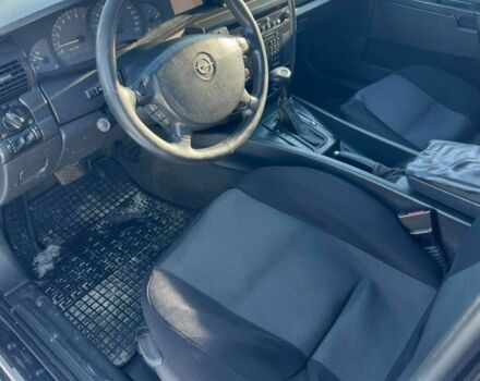 Серый Опель Омега, объемом двигателя 2.2 л и пробегом 326 тыс. км за 2000 $, фото 4 на Automoto.ua