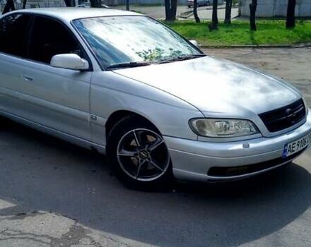 Серый Опель Омега, объемом двигателя 2.2 л и пробегом 250 тыс. км за 4200 $, фото 2 на Automoto.ua