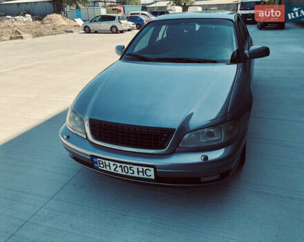 Серый Опель Омега, объемом двигателя 2.6 л и пробегом 368 тыс. км за 3600 $, фото 9 на Automoto.ua