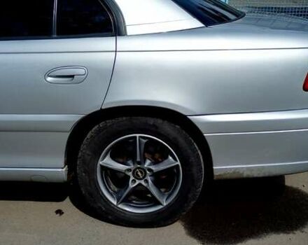 Серый Опель Омега, объемом двигателя 2.2 л и пробегом 250 тыс. км за 4200 $, фото 7 на Automoto.ua