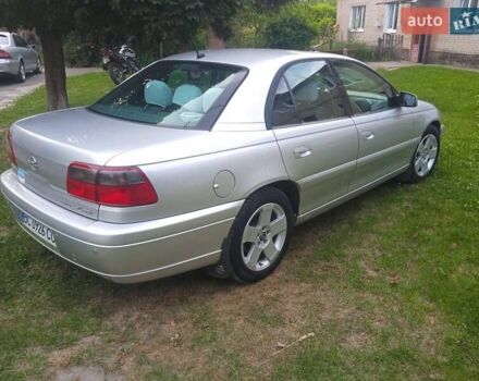 Серый Опель Омега, объемом двигателя 2.5 л и пробегом 263 тыс. км за 4000 $, фото 3 на Automoto.ua