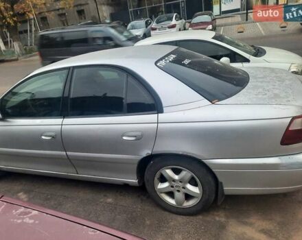 Серый Опель Омега, объемом двигателя 2.2 л и пробегом 320 тыс. км за 1800 $, фото 2 на Automoto.ua