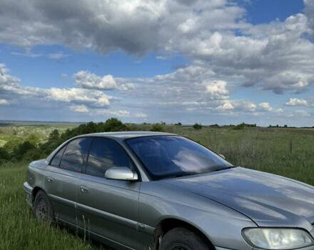 Серый Опель Омега, объемом двигателя 3.2 л и пробегом 350 тыс. км за 3000 $, фото 3 на Automoto.ua