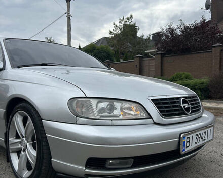 Серый Опель Омега, объемом двигателя 2.6 л и пробегом 340 тыс. км за 3750 $, фото 7 на Automoto.ua