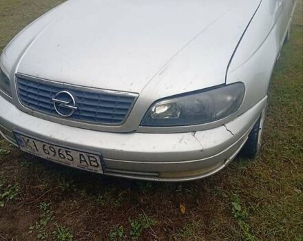 Серый Опель Омега, объемом двигателя 2.2 л и пробегом 331 тыс. км за 1900 $, фото 3 на Automoto.ua