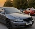 Сірий Опель Омега, об'ємом двигуна 2.2 л та пробігом 500 тис. км за 2002 $, фото 4 на Automoto.ua