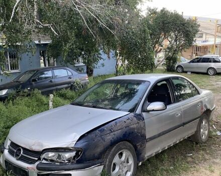 Сірий Опель Омега, об'ємом двигуна 2 л та пробігом 174 тис. км за 700 $, фото 3 на Automoto.ua