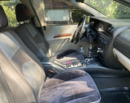 Сірий Опель Омега, об'ємом двигуна 2 л та пробігом 410 тис. км за 1900 $, фото 2 на Automoto.ua