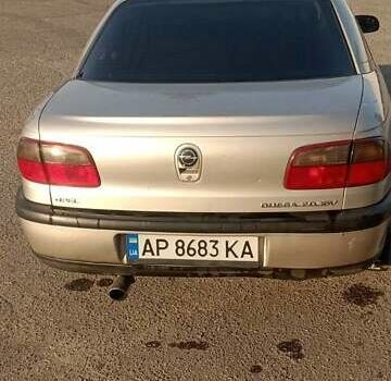 Серый Опель Омега, объемом двигателя 2 л и пробегом 320 тыс. км за 2300 $, фото 4 на Automoto.ua