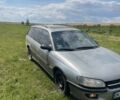 Серый Опель Омега, объемом двигателя 2 л и пробегом 250 тыс. км за 1300 $, фото 1 на Automoto.ua