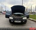 Серый Опель Омега, объемом двигателя 2 л и пробегом 247 тыс. км за 1999 $, фото 12 на Automoto.ua