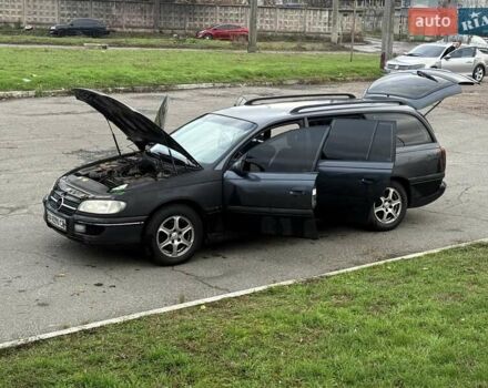 Сірий Опель Омега, об'ємом двигуна 2 л та пробігом 247 тис. км за 2200 $, фото 14 на Automoto.ua