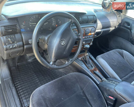 Серый Опель Омега, объемом двигателя 2.5 л и пробегом 299 тыс. км за 2500 $, фото 9 на Automoto.ua