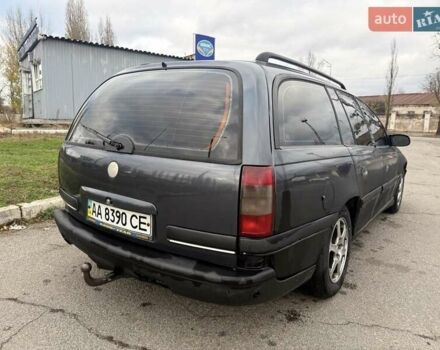 Сірий Опель Омега, об'ємом двигуна 2 л та пробігом 247 тис. км за 2200 $, фото 4 на Automoto.ua