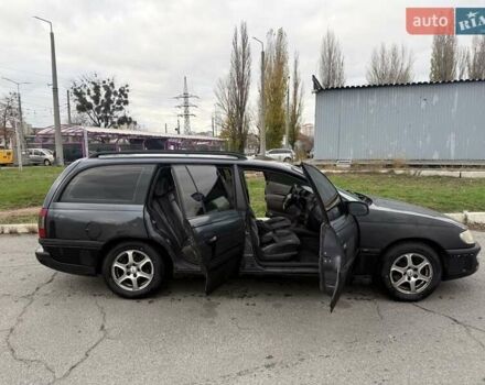 Сірий Опель Омега, об'ємом двигуна 2 л та пробігом 247 тис. км за 2200 $, фото 24 на Automoto.ua