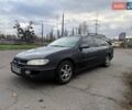 Сірий Опель Омега, об'ємом двигуна 2 л та пробігом 247 тис. км за 2200 $, фото 1 на Automoto.ua