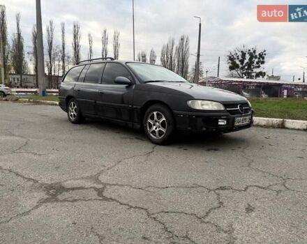 Сірий Опель Омега, об'ємом двигуна 2 л та пробігом 247 тис. км за 2200 $, фото 6 на Automoto.ua