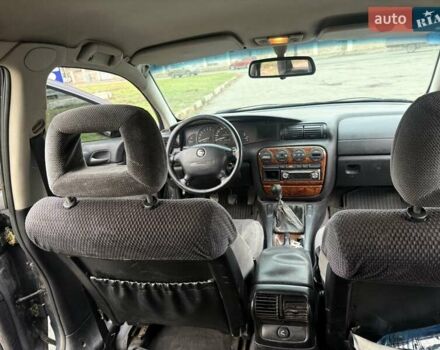 Сірий Опель Омега, об'ємом двигуна 2 л та пробігом 247 тис. км за 2200 $, фото 21 на Automoto.ua