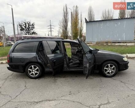 Сірий Опель Омега, об'ємом двигуна 2 л та пробігом 247 тис. км за 2200 $, фото 22 на Automoto.ua