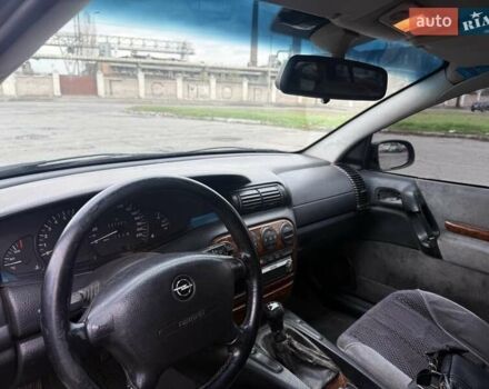 Сірий Опель Омега, об'ємом двигуна 2 л та пробігом 247 тис. км за 2200 $, фото 28 на Automoto.ua