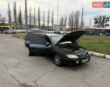 Сірий Опель Омега, об'ємом двигуна 2 л та пробігом 247 тис. км за 2200 $, фото 12 на Automoto.ua