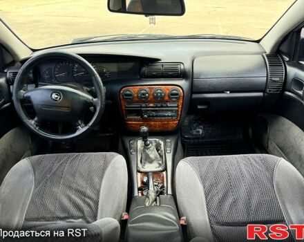 Сірий Опель Омега, об'ємом двигуна 2 л та пробігом 300 тис. км за 1400 $, фото 10 на Automoto.ua